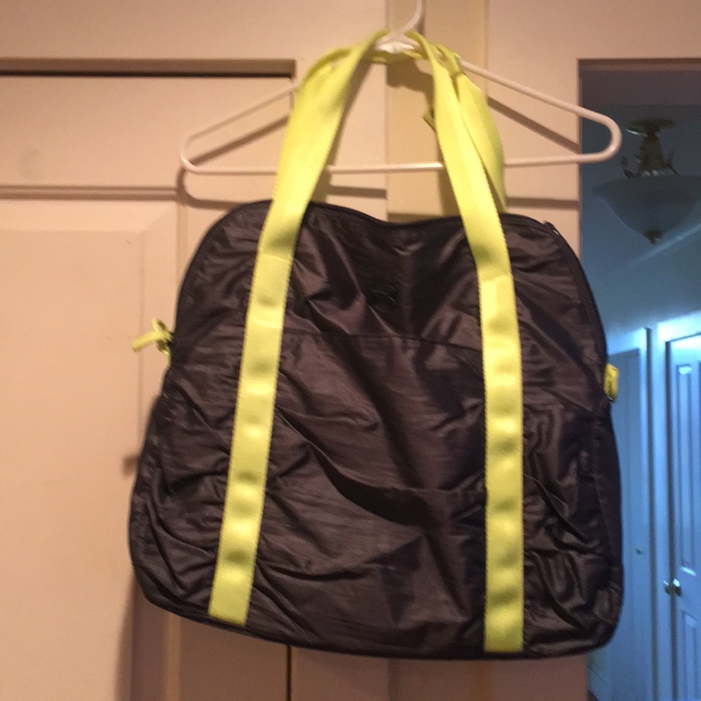 Gray gym bag with neon yellow trim